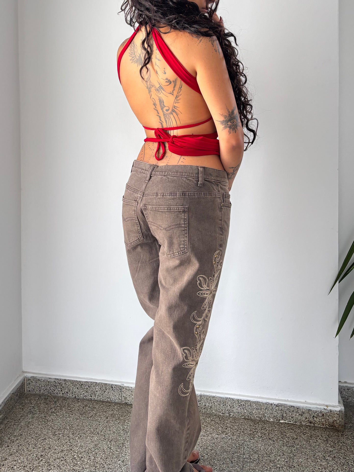 Brown flare pants with flower embroidery