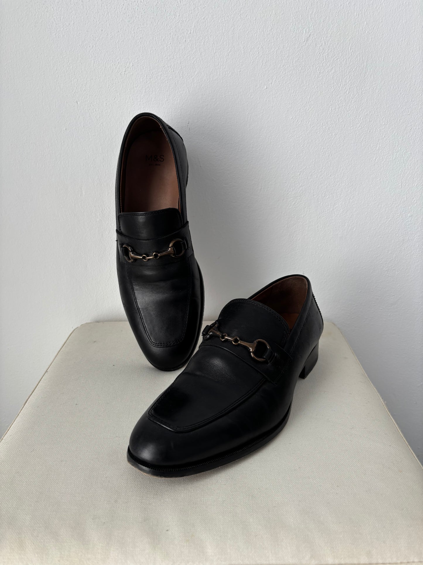 Black loafers with buckle