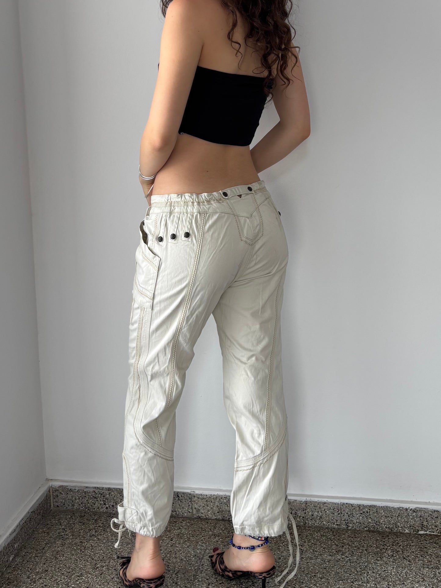 White/ Cream capri pants with stud details