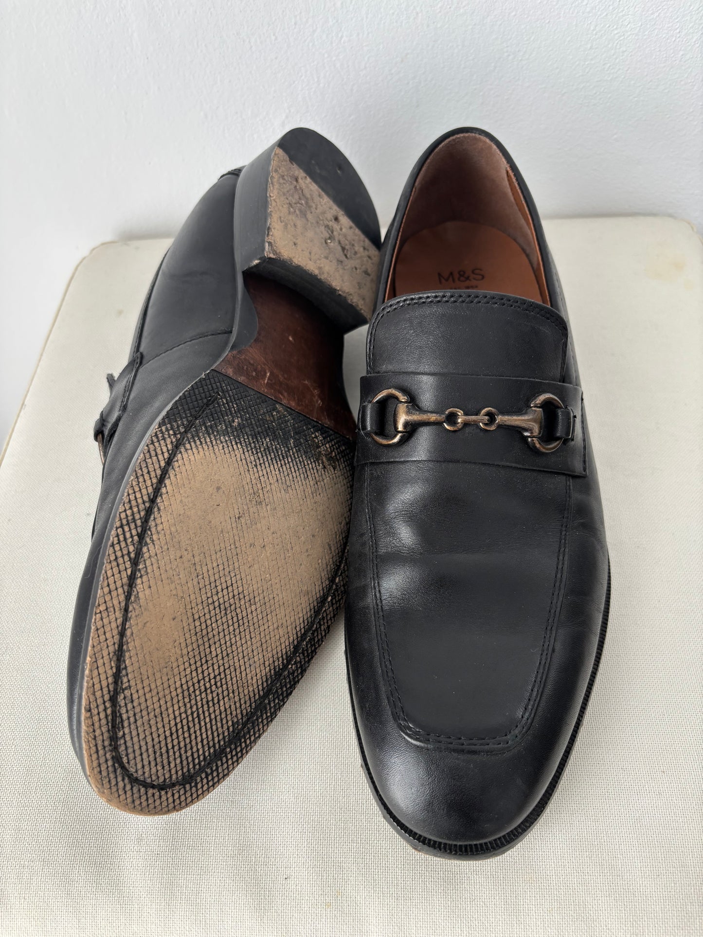 Black loafers with buckle