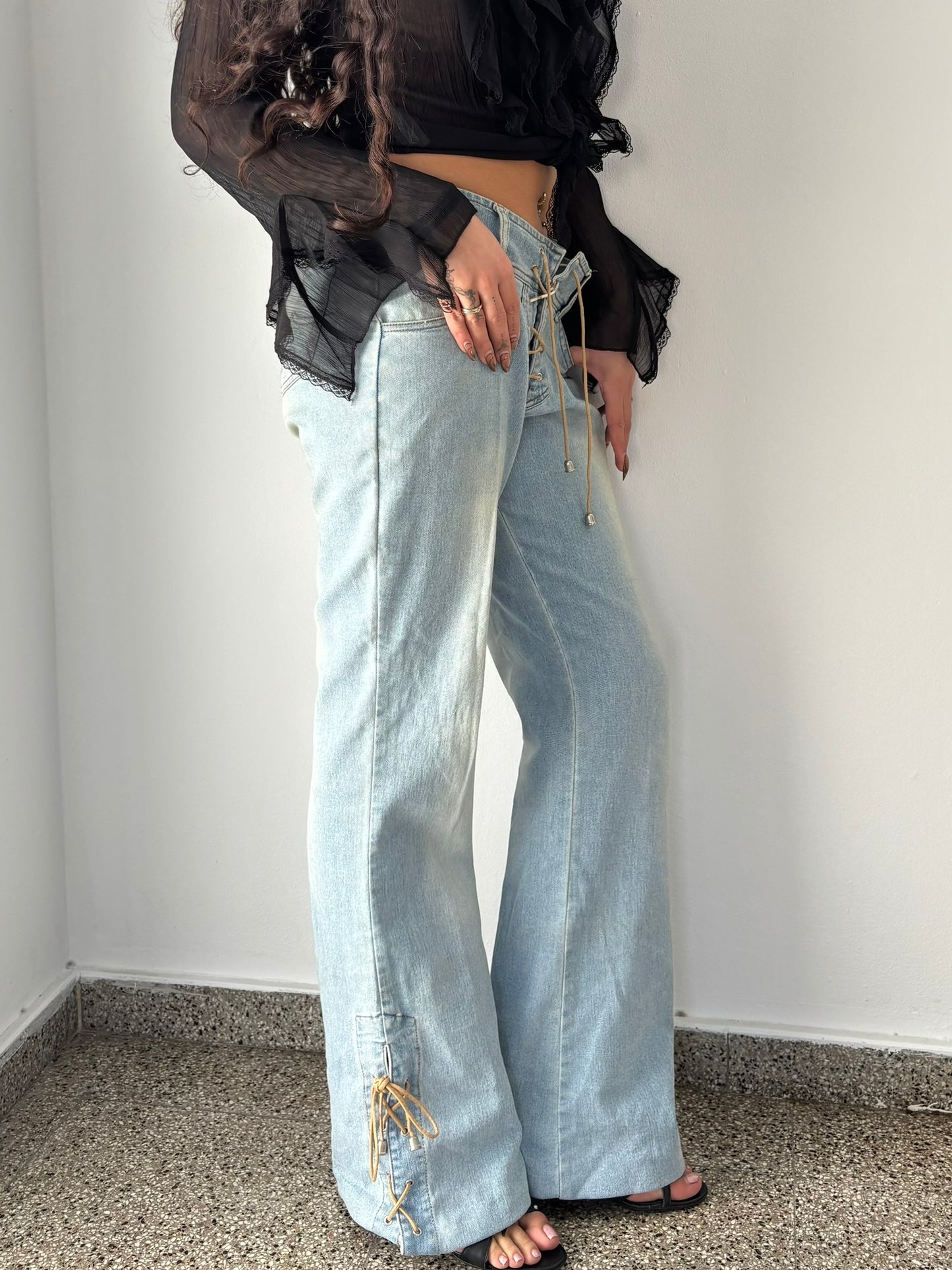 Light wash baggy jeans with ties