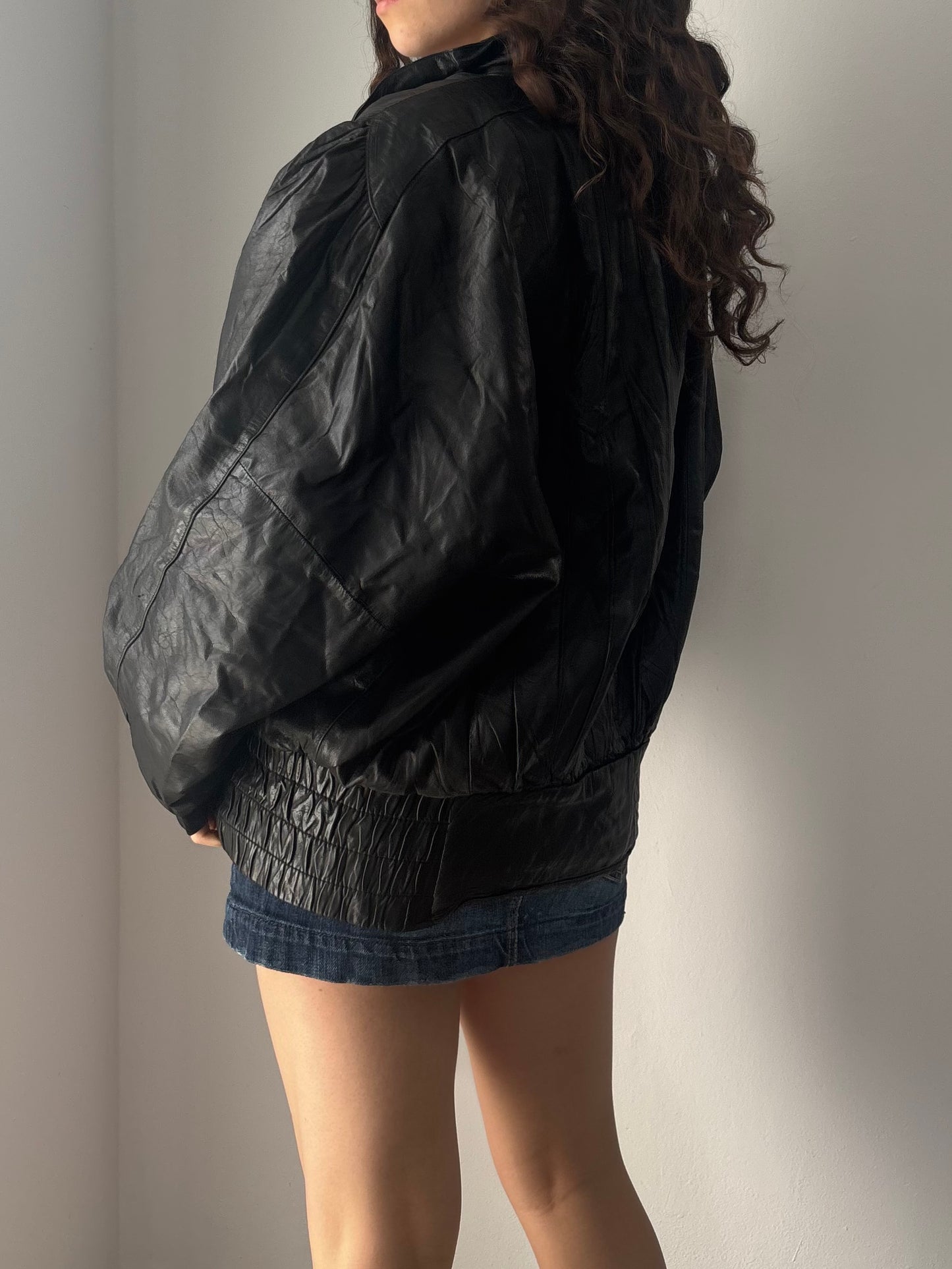 Vintage Italian black leather puffer jacket