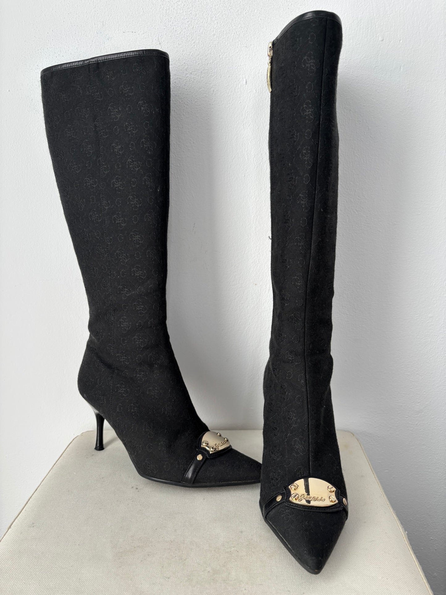 Guess heeled boots with gold buckle