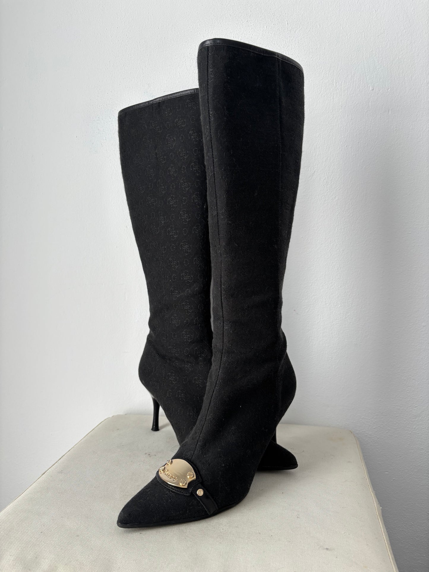 Guess heeled boots with gold buckle