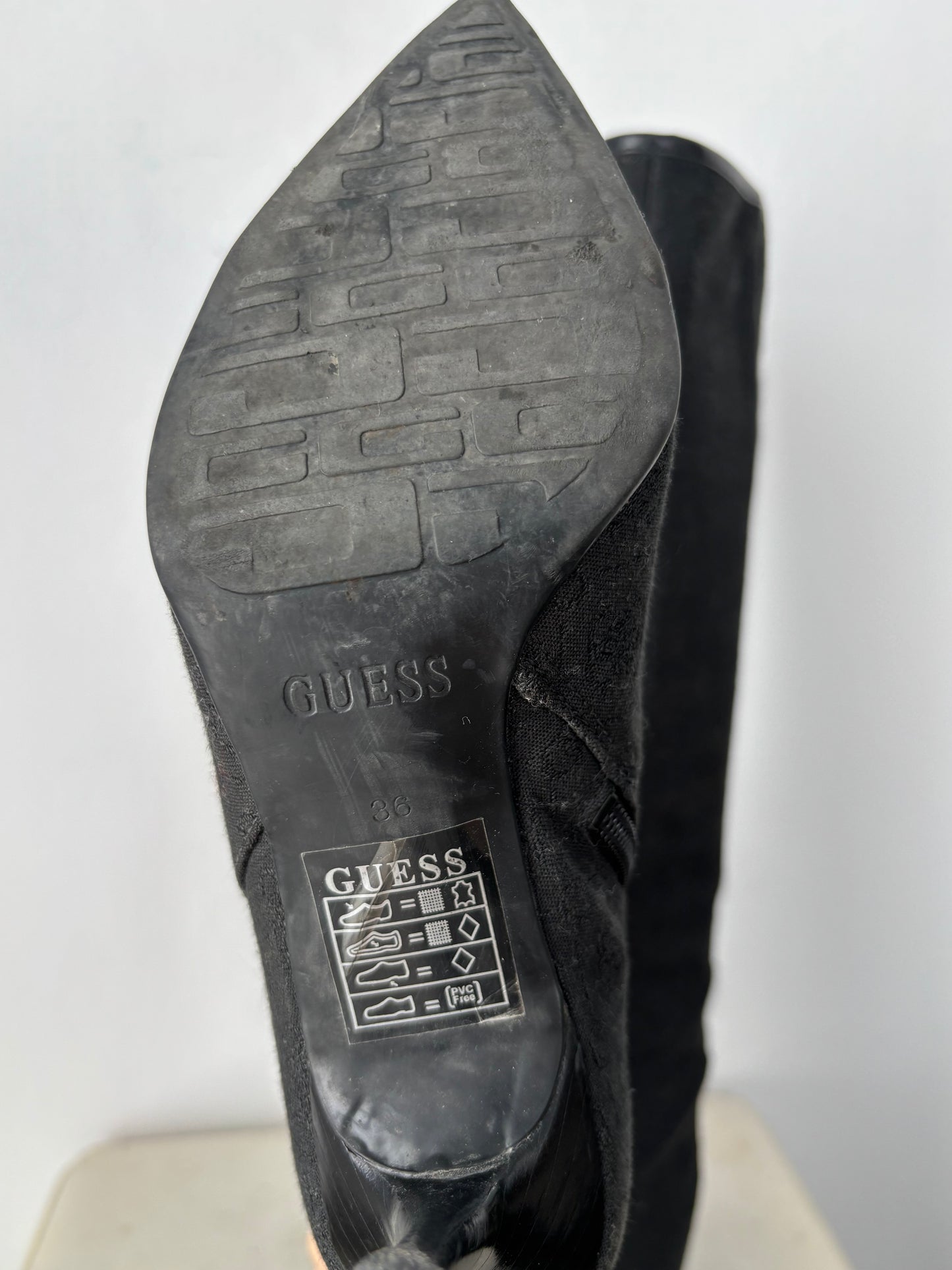 Guess heeled boots with gold buckle