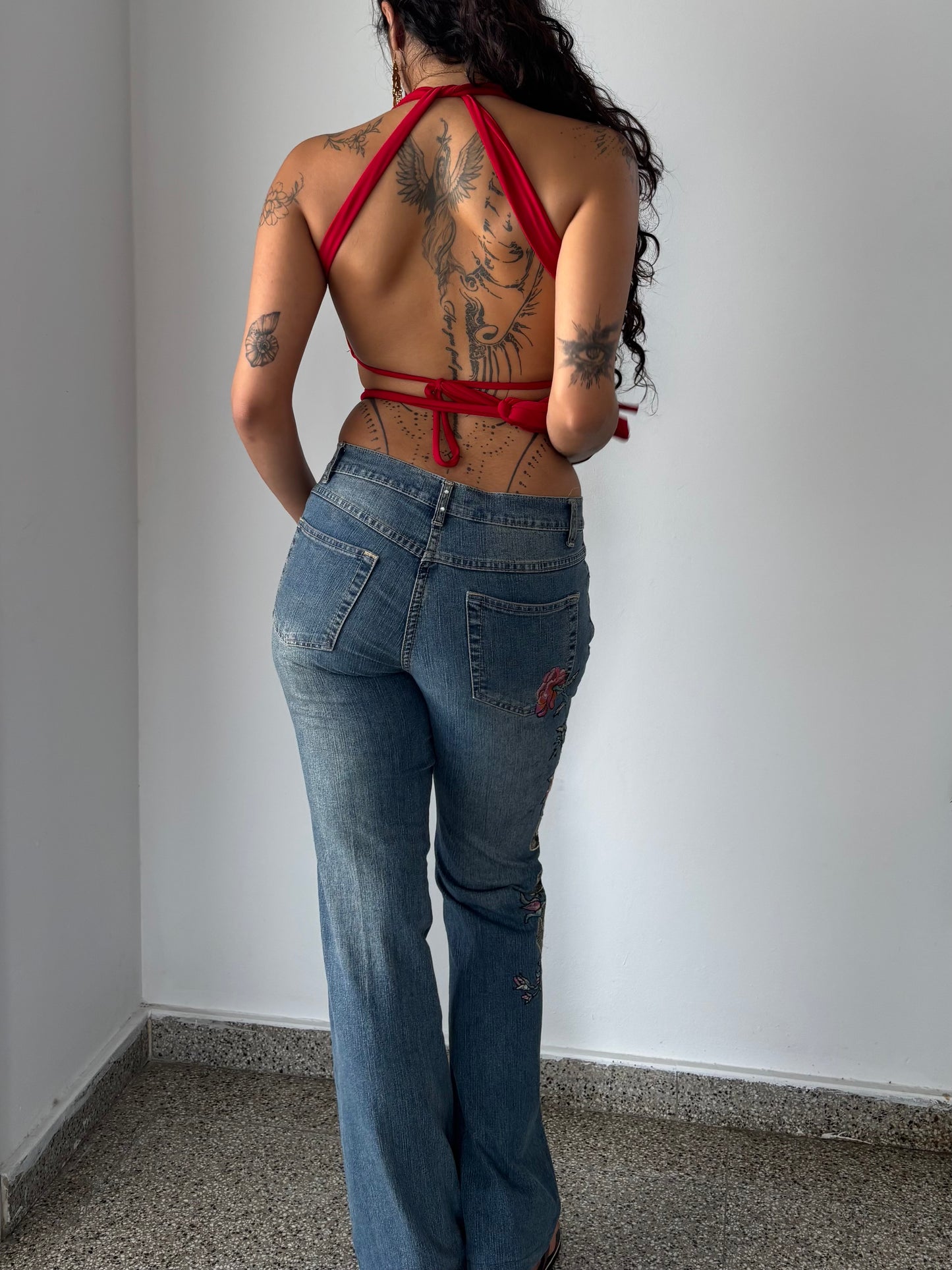 Low rise flare jeans with rose embroidery