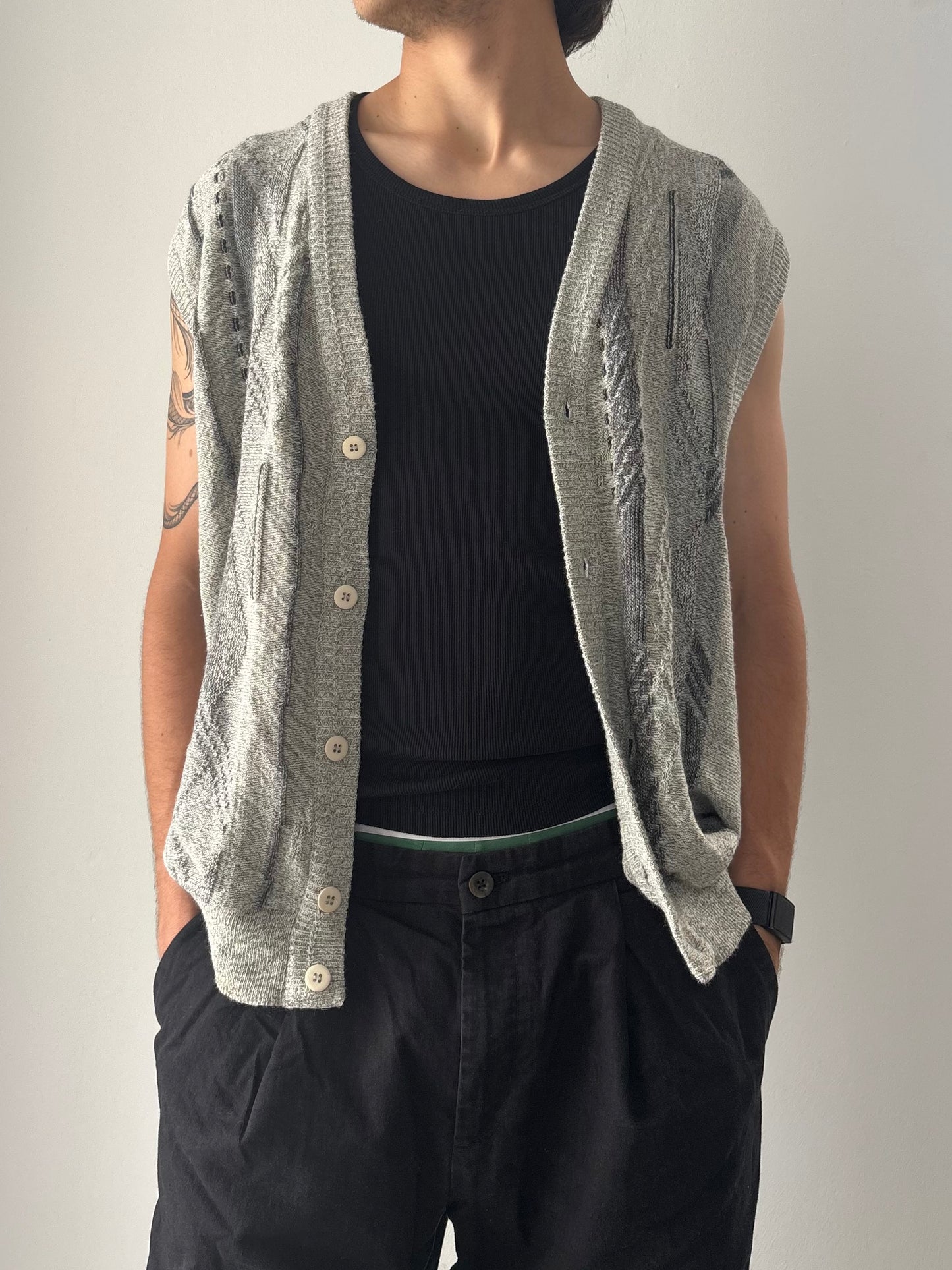Grey sweater vest with patterns
