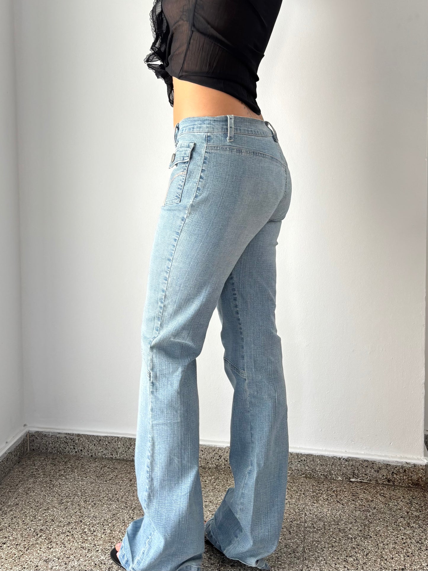 Light wash jeans with flower details