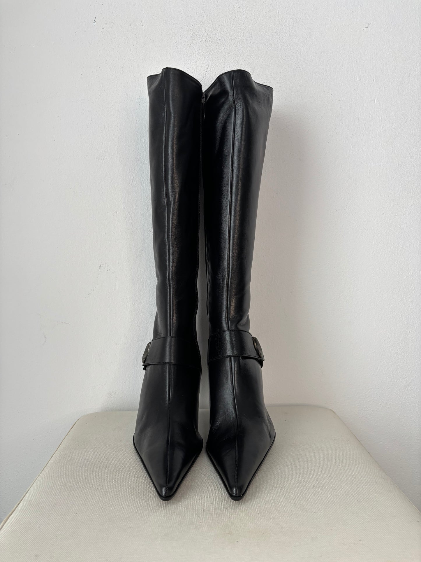 Black leather heeled boots with moon stud