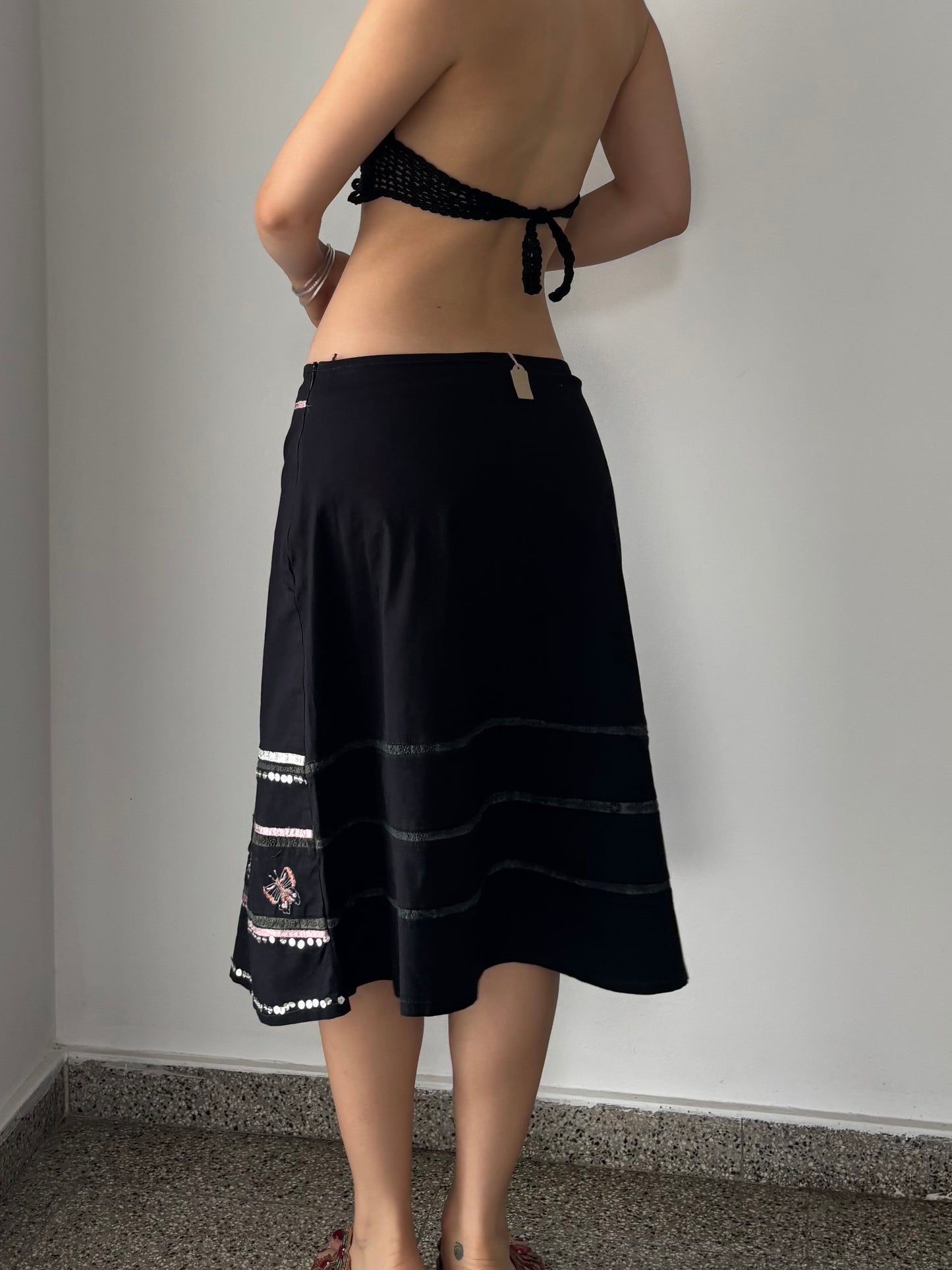 Black midi skirt with butterfly details