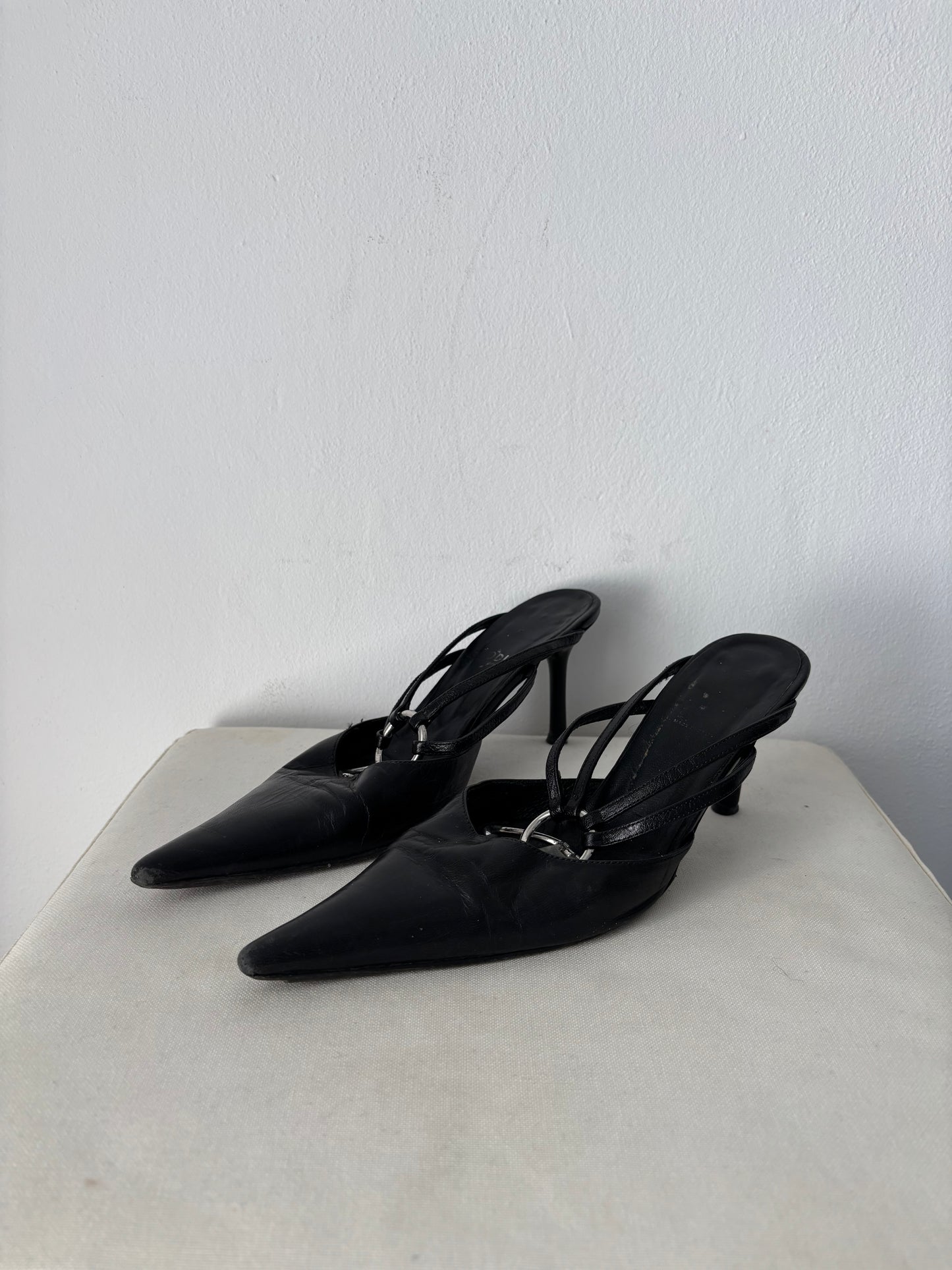 Black leather kitten heels with buckles