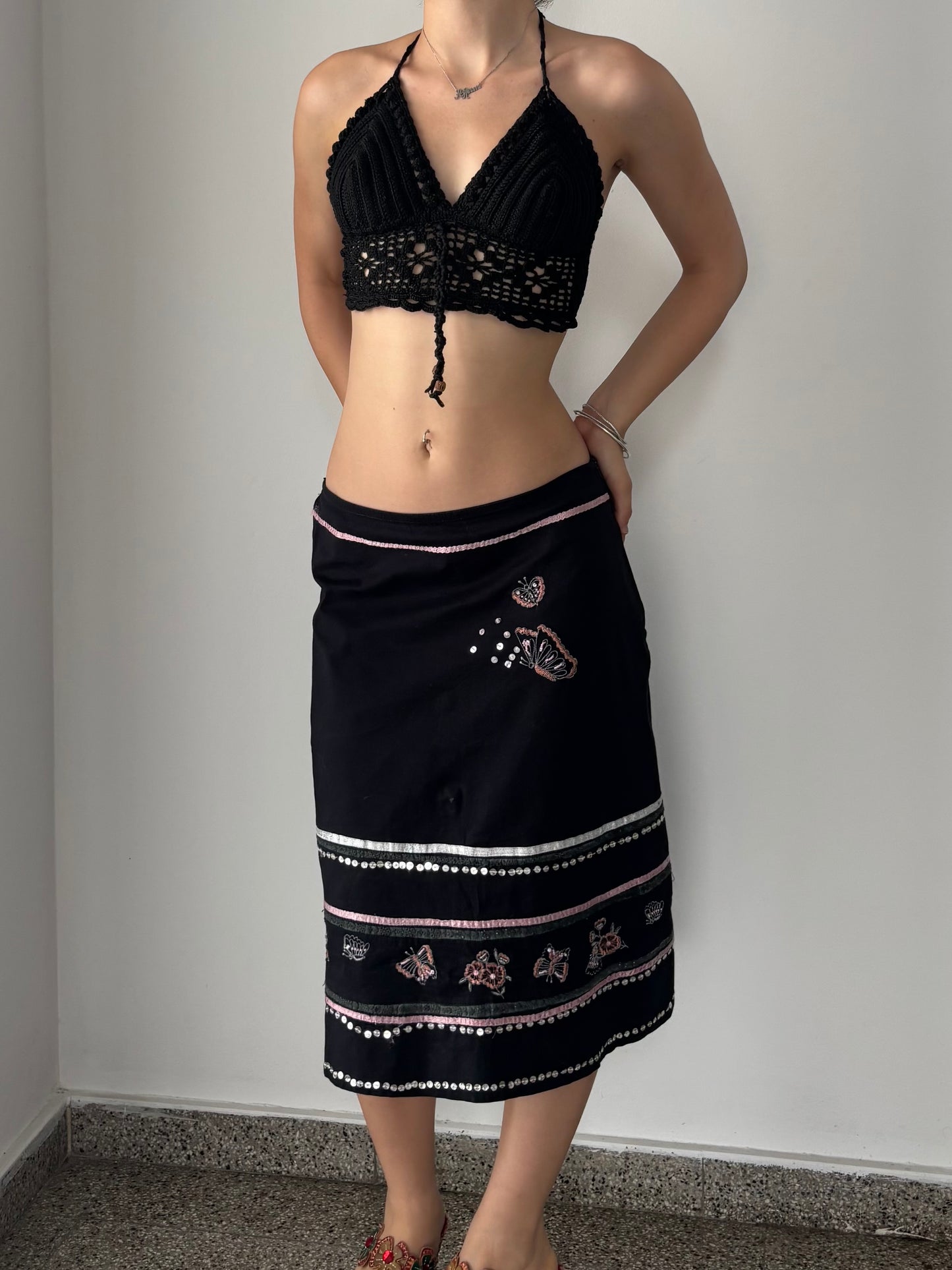 Black midi skirt with butterfly details