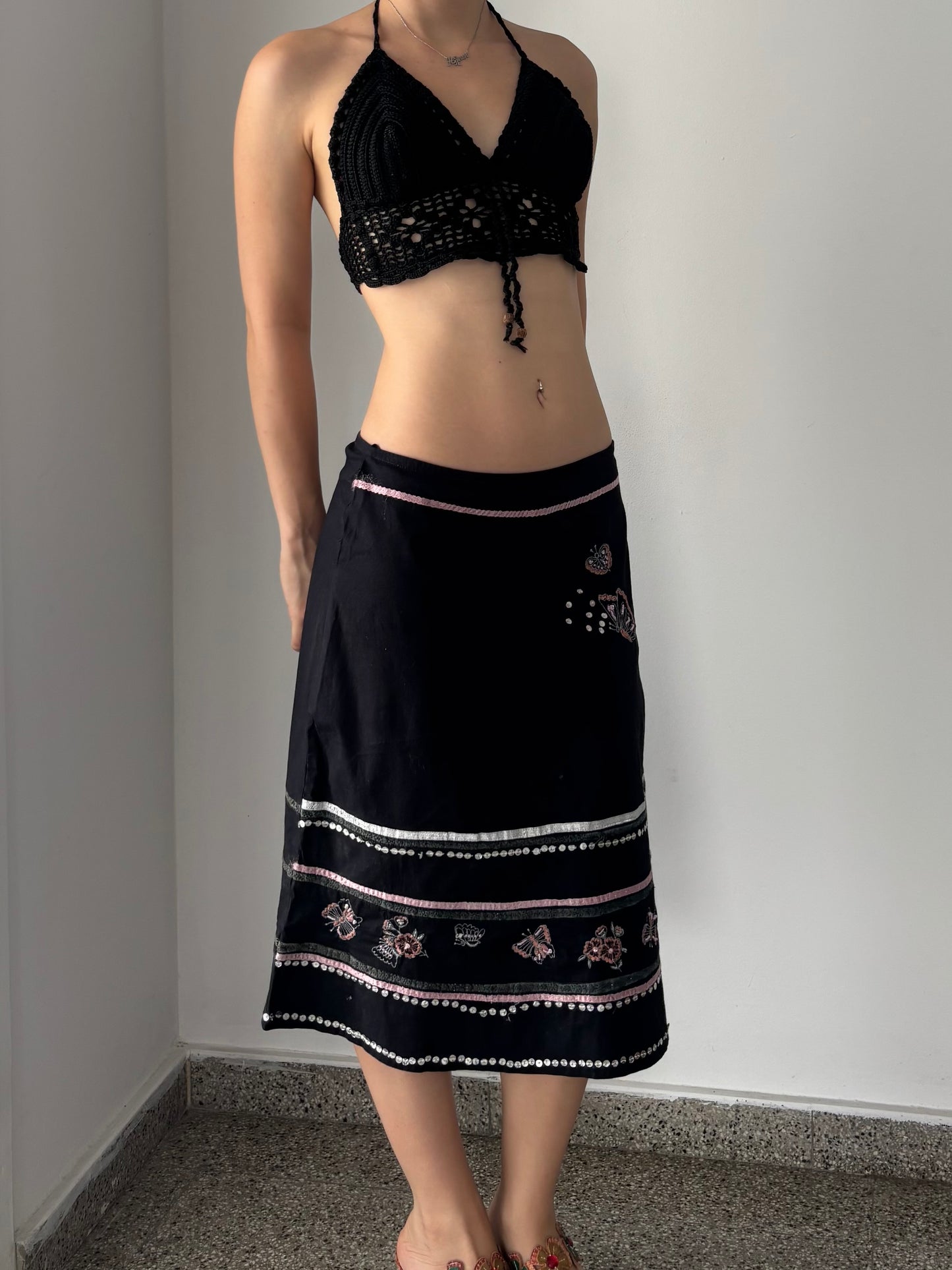 Black midi skirt with butterfly details