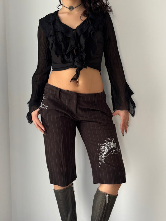 Black shorts with skeletons