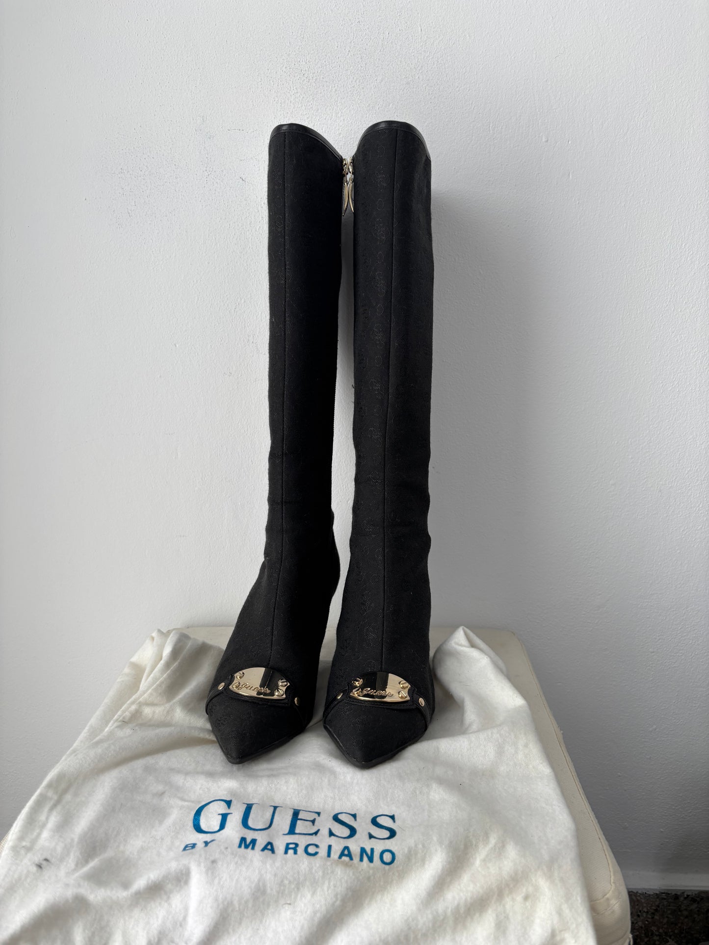 Guess heeled boots with gold buckle